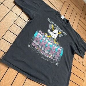Vintage 1993 Mighty Ducks Tee • Starter • XL
OG 1993 Anaheim Mighty Ducks tee
